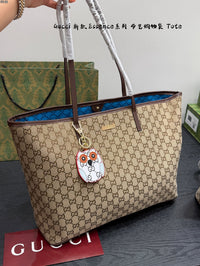 Ophidia Tote Bag