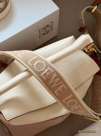 Puzzle Edge Top-Handle Bag