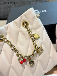 Jade Quilted Drawstring Bucket Bag