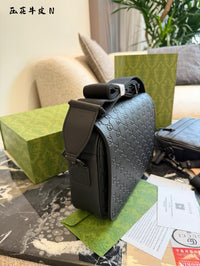 Embossed Leather Messenger Bag
