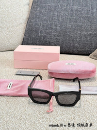 MU 09WS 1AB5S0 Cat Eye Sunglasses