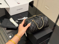 Quilted Barrel Clutch