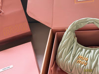 Matelassé Wander Top-Handle Bag