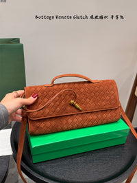 Andiamo Intrecciato Suede Clutch