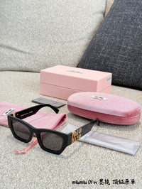 MU 09WS 1AB5S0 Cat Eye Sunglasses