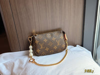 Mini Pochette Accessoires