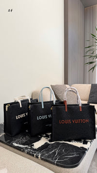 Embossed Monogram Tote Bag