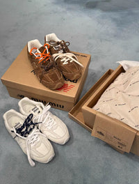 MIU x NB530 SL Sneakers