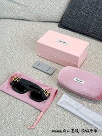 MU 09WS 1AB5S0 Cat Eye Sunglasses