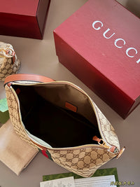 Ophidia Top Handle Bag