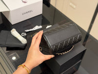 Quilted Barrel Clutch