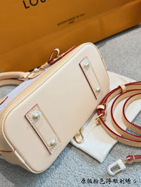Alma BB Monogram Emblème Rose Ribbon Pink