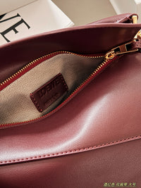 Puzzle Edge Top-Handle Bag