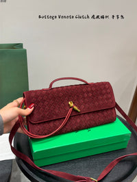 Andiamo Intrecciato Suede Clutch