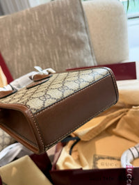 Ophidia Tote Bag