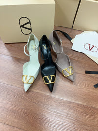 Signature D'Orsay Patent Leather Pumps