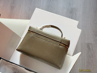 26A Embossed Top Handle Vanity Bag