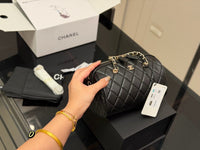 Quilted Barrel Clutch