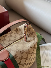 Ophidia Top Handle Bag