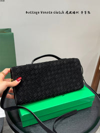 Andiamo Intrecciato Suede Clutch