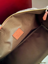 Ophidia Top Handle Bag