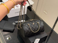 Quilted Barrel Clutch
