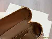 26A Embossed Top Handle Vanity Bag