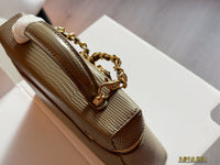 26A Embossed Top Handle Vanity Bag