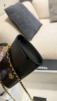 26A Lizard Embossed Top Handle Clutch