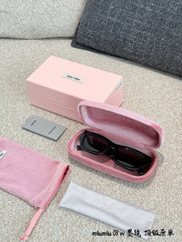 MU 09WS 1AB5S0 Cat Eye Sunglasses