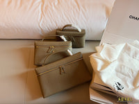 26A Embossed Top Handle Vanity Bag