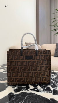 Embossed Monogram Tote Bag
