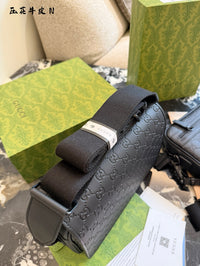 Embossed Leather Messenger Bag
