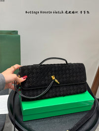 Andiamo Intrecciato Suede Clutch