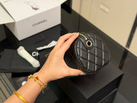 Quilted Barrel Clutch
