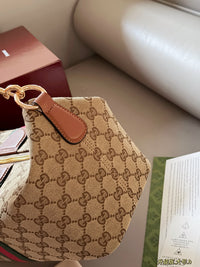 Ophidia Top Handle Bag