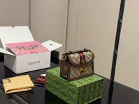 Padlock Supreme Mini Top Handle Bag
