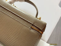 26A Embossed Top Handle Vanity Bag