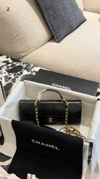 26A Lizard Embossed Top Handle Clutch