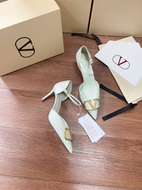 Signature D'Orsay Patent Leather Pumps