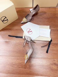 Signature D'Orsay Patent Leather Pumps