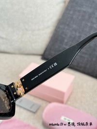 MU 09WS 1AB5S0 Cat Eye Sunglasses
