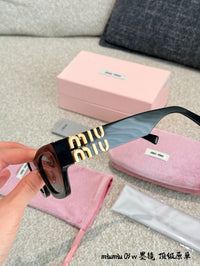 MU 09WS 1AB5S0 Cat Eye Sunglasses