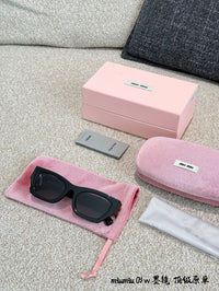MU 09WS 1AB5S0 Cat Eye Sunglasses