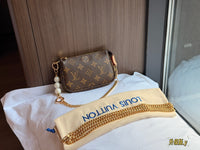 Mini Pochette Accessoires