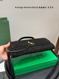 Andiamo Intrecciato Suede Clutch