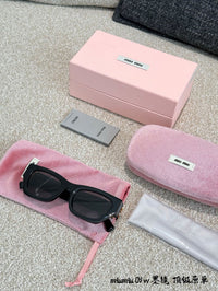 MU 09WS 1AB5S0 Cat Eye Sunglasses