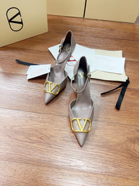 Signature D'Orsay Patent Leather Pumps