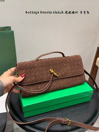 Andiamo Intrecciato Suede Clutch