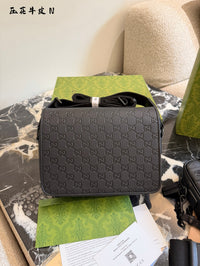 Embossed Leather Messenger Bag